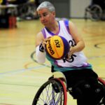 Anna Jackson has the ball while playing wheelchair basketball