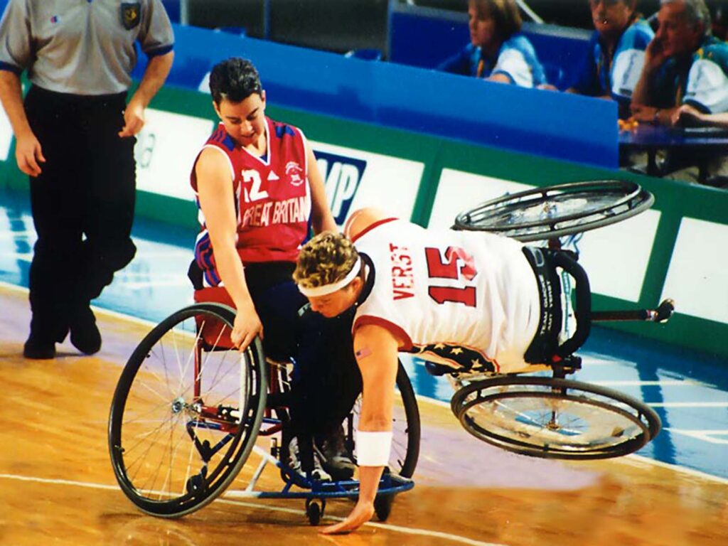 Anna Jackson (red vest) playing basketball for Great Britain.