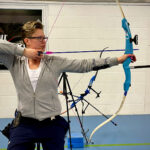 Sarah Hope doing archery