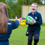 A child playing rugby