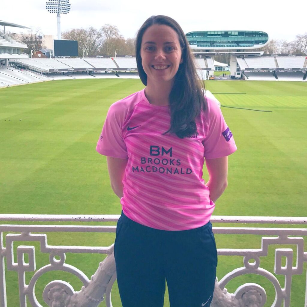 Olivia wearing cricket shirt