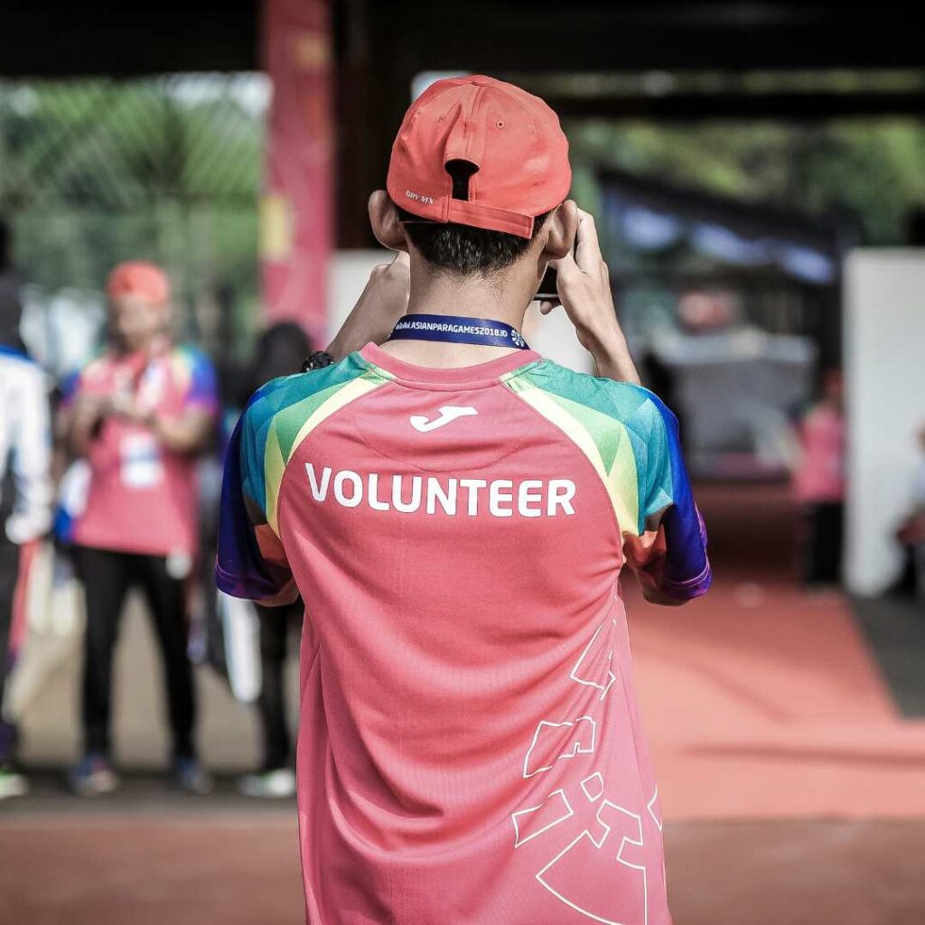 Person wearing volunteer t-shirt